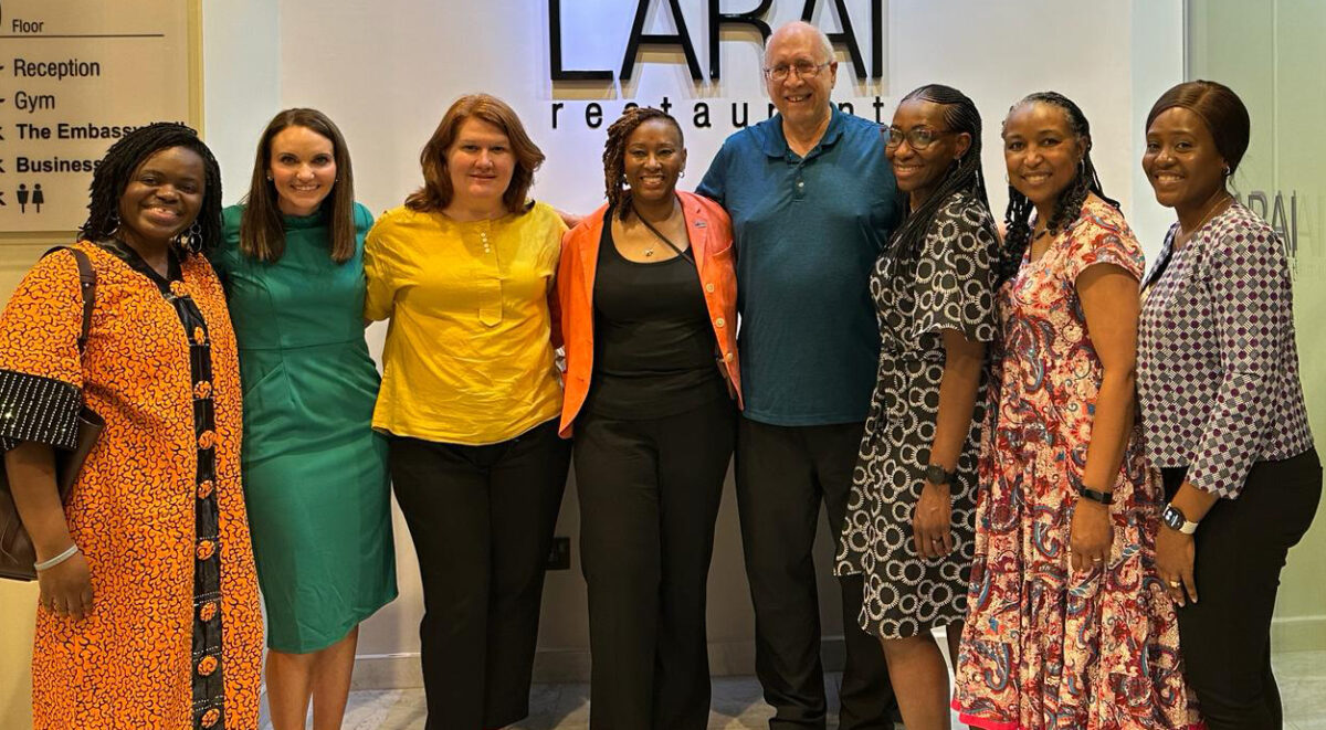 A group of people pose for a photo.